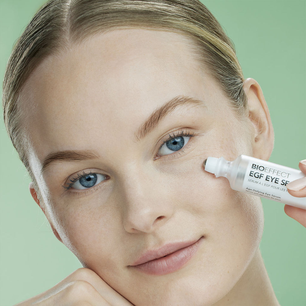 woman applying BIOEFFECT EGF Eye Serum