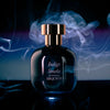 arquiste indigo smoke perfume bottle with smoke behind it