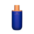 Augustinus Bader The Eye Cream in a sleek, matte royal blue cylindrical bottle with a metallic bronze cap.