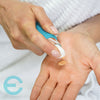 woman pumping Epicuren Skin Brightening Serum in hand