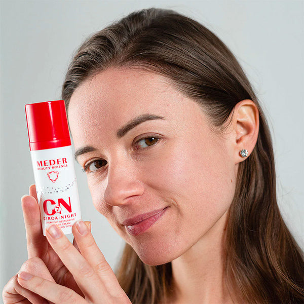 woman holding Meder Circa-Night Cream