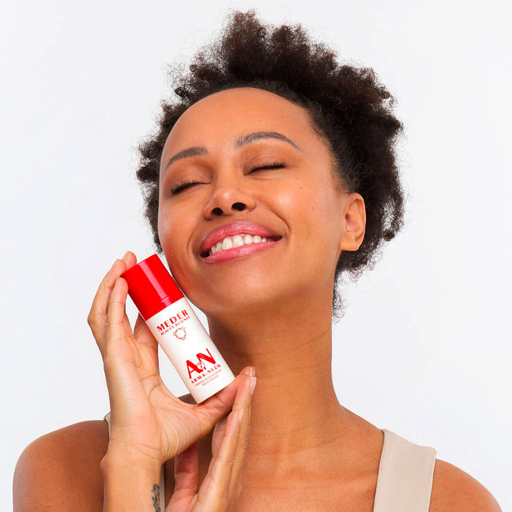 woman holding Meder Arma-Neck Cream