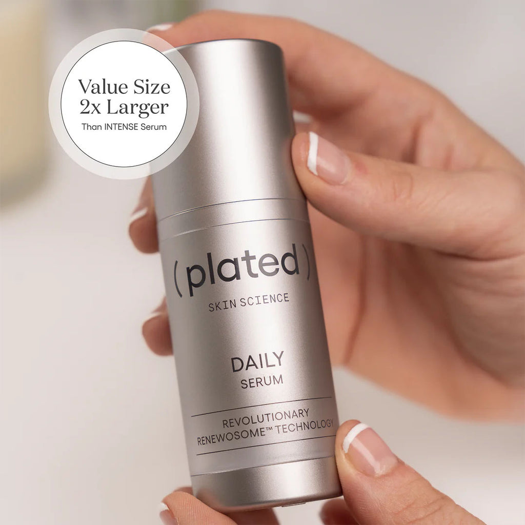 hand holding (plated) Daily Serum